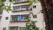 Boy dangles from sixth-floor window in China after grandmother forgets flat keys