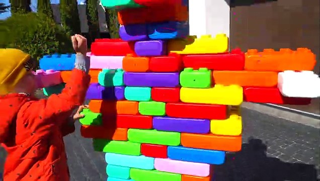 Artem builds a robot from Lego blocks