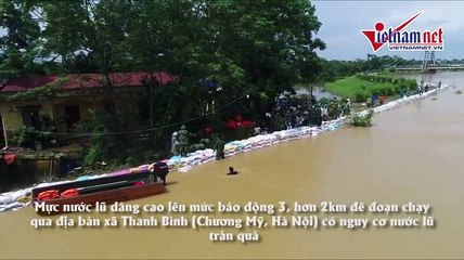 Bờ cát nhỏ trước triệu khối nước lũ: Vạn dân Hà Nội nguy cấp