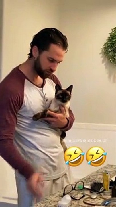 Dad Who Claims he Doesn't Like Cat Caught Red Handed