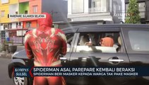 Spiderman Beri Masker Pada Warga Tak Pake Masker