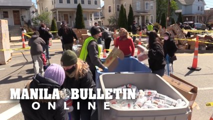 Thousands line up for food handouts in Massachusetts