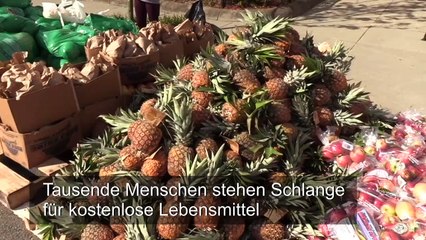 Tausende stehen in Massachusetts um Lebensmittel an