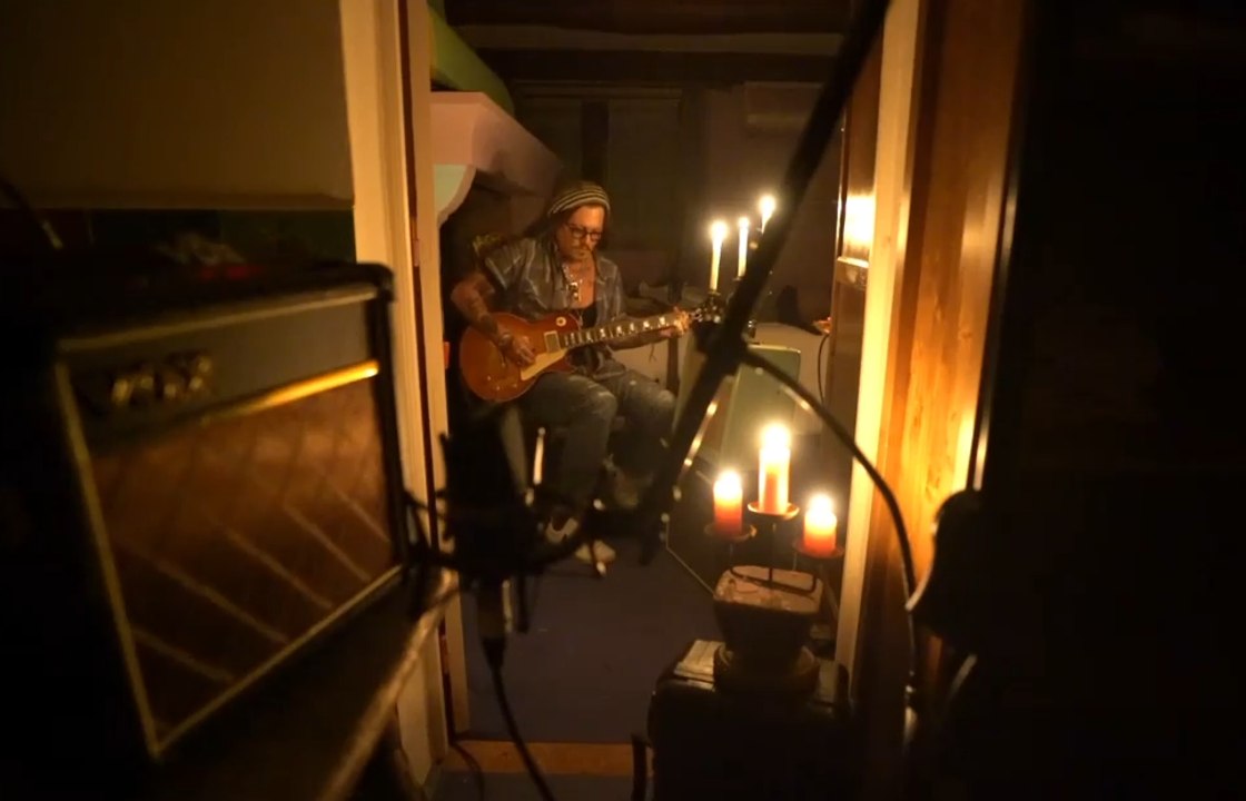 Johnny Depp playing guitar in Paris during lockdown