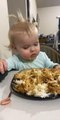 Toddler Girl Nods off Over a Plateful of Food