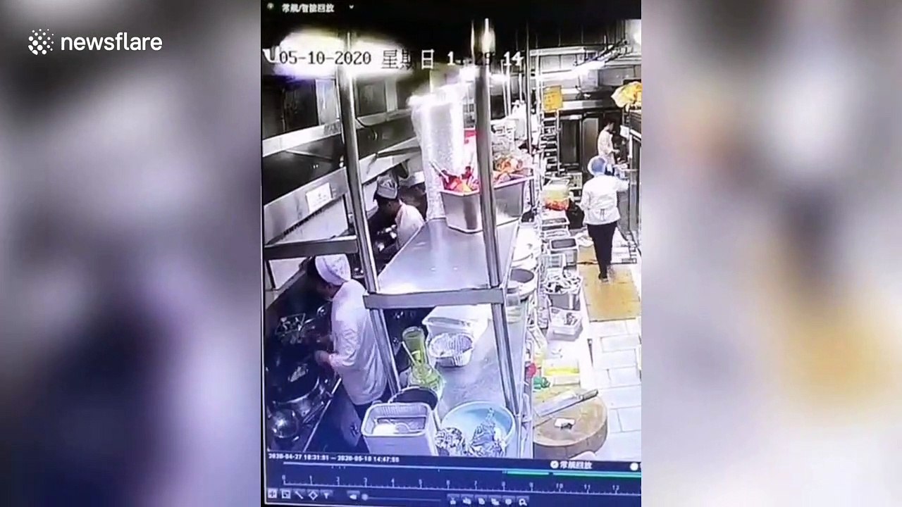 Restaurant in China suspended and apologises after cook allegedly spits on food
