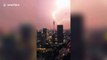 Dramatic moment powerful lightning bolt strikes Canton Tower in China