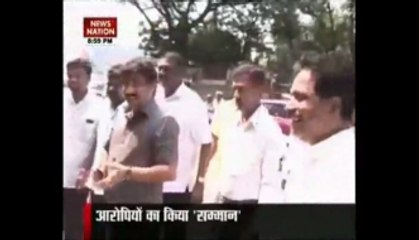 Uddhav pats Sena workers who blackened Kulkarni's face