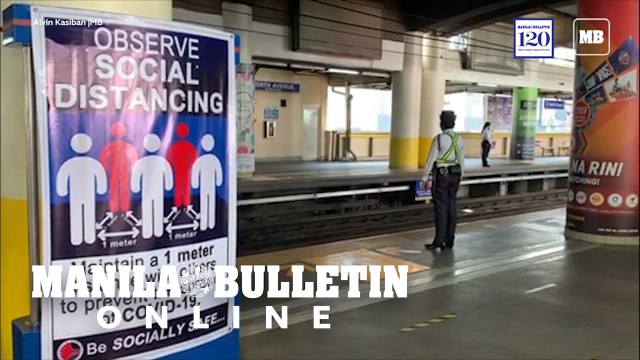 Visual cues and lines were taped on the floor of the MRT-North Avenue station in Quezon City