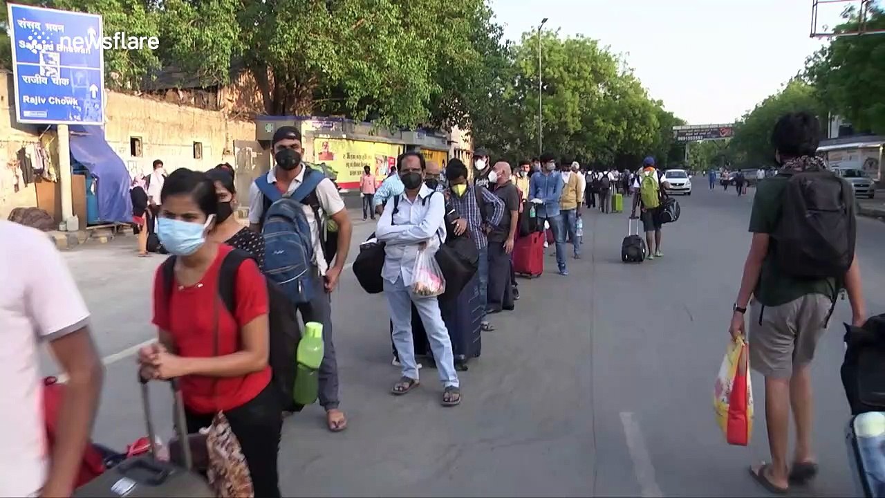 Thousands line up to board trains as Indian Railways resume services