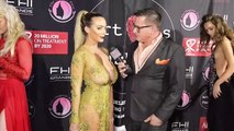 Lindsey Pelas wears Stello on the Art Hearts FW Red Carpet
