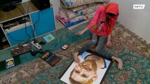 Toe-riffic Iranian artist creates portraits with her feet in Sefidshahr