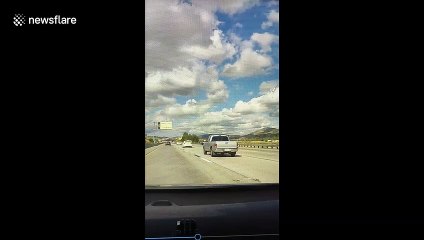 Reportedly distracted truck driver hits a car on California highway