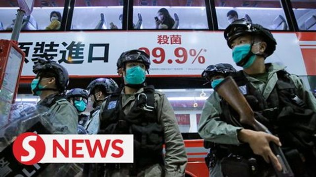 Police fire pepper spray at Hong Kong protesters