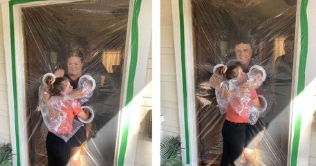 Une petite fille a créé un « rideau câlin » pour pouvoir étreindre sa famille pendant le confinement