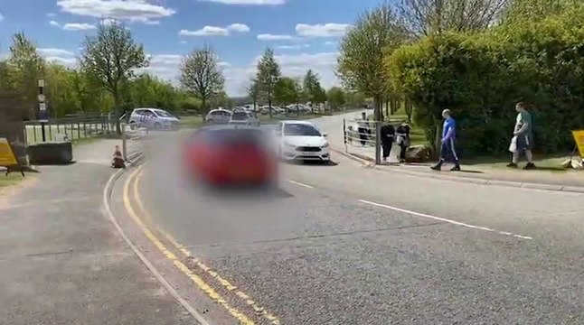 Cars queue to enter Herrington Country Park following the easing of lockdown measures