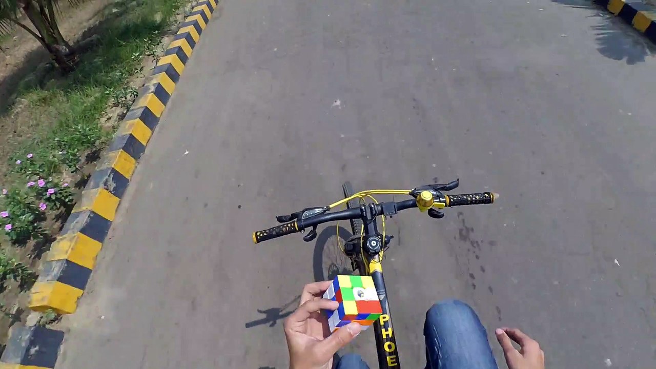 Solving a Rubik's Cube while Cycling(With One Hand)