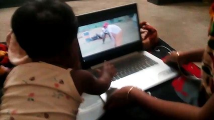 Cute baby using Laptop time