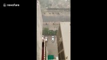 Amazing footage of torrential rain and a dust storm combining over Delhi in India