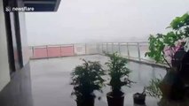 Typhoon Ambo batters Filipino university buildings the day after making landfall