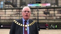 The Mayor of Preston unveils a Thank You banner