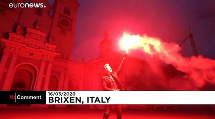 Artist lights SOS flares to mark Day of Light