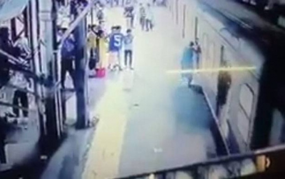 Woman slips while boarding moving train at Kurla station in Mumbai