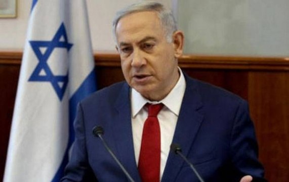 Israel Prime Minister Benjamin Netanyahu serves dessert to Shinzo Abe in a shoe