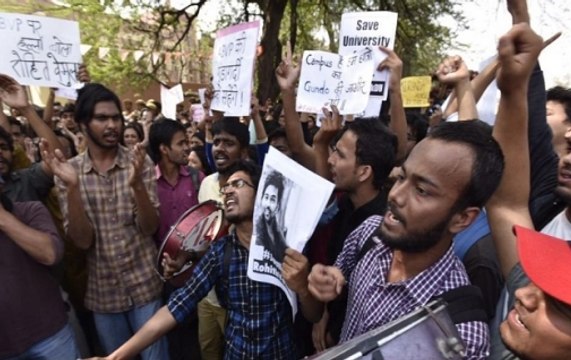 DU students stage protest against sexual harassment under the garb of Holi celebrations