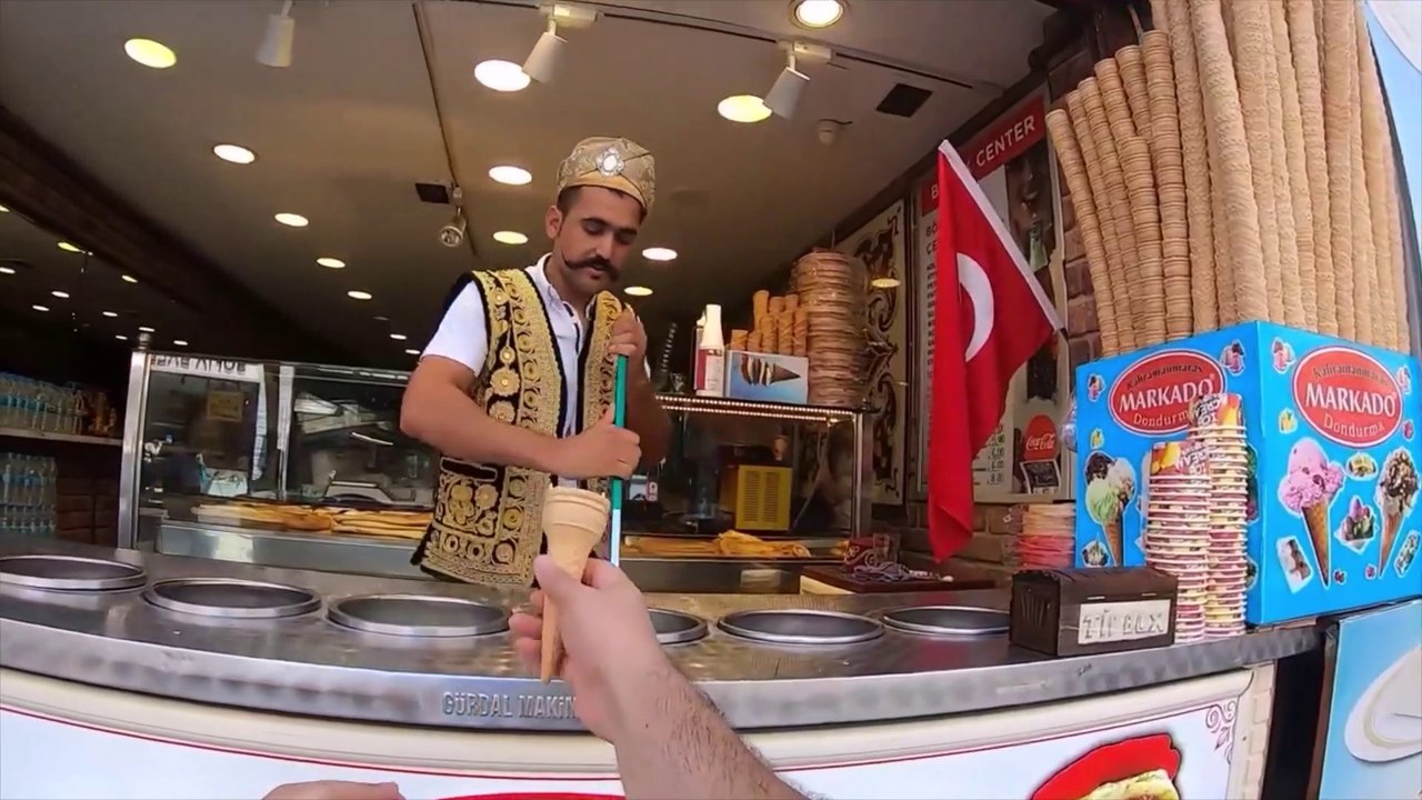 Funy ice-cream man joking with customer's!