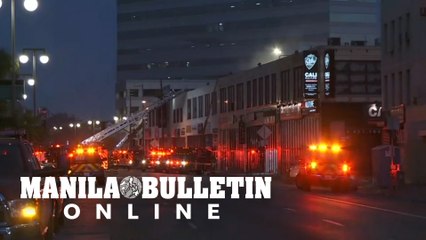 LA blaze: Firefighters at cordoned off building