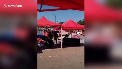 Disgusting video shows Chinese vendor using mouth to spray water over waxberries