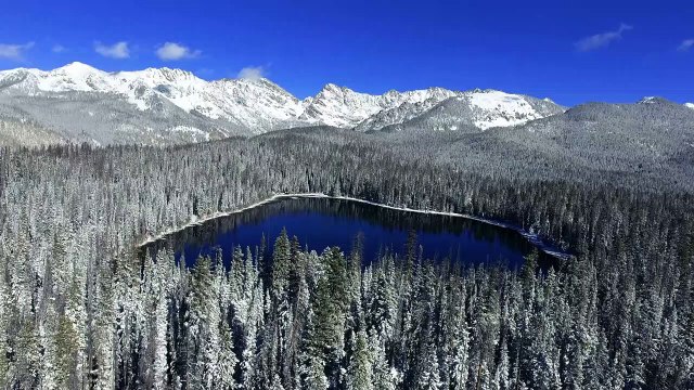 [NO COPYRIGHT VIDEO] Aerial Drone View of a Wintry Snow Covered Lake