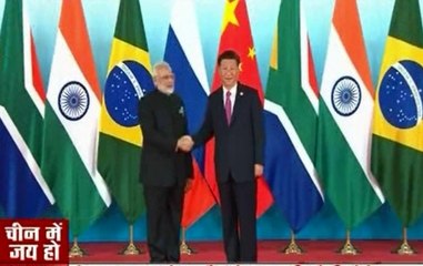 PM Modi welcomed by Jinping in BRICS 2017