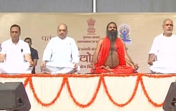 International Yoga Day: Ramdev, Amit Shah perform yoga in Ahmedabad