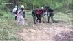 Dramatic moment Thai family and three dogs are rescued by helicopter after spending six days lost in forest