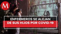 Hace cque pareja de enfermeros no abrazan a sus hijos por covid-19