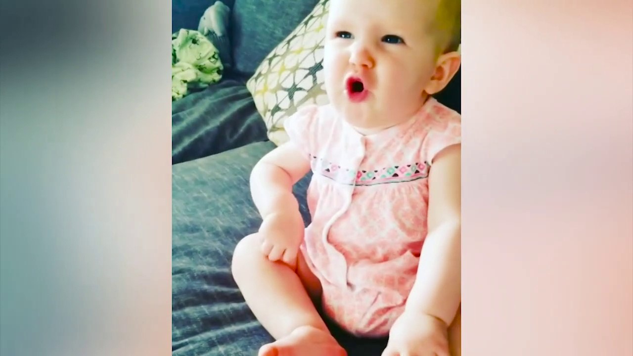 Funny Baby Mimics Daddy