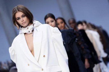 Kaia Gerber Debuted a Broken Arm in a Bikini Selfie