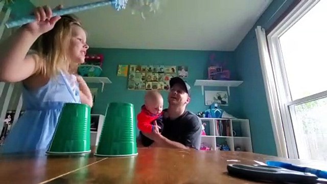 Four-Year-Old Baffled by Magic Ball Trick