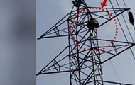 A man in Chennai climbs atop high tension electric pole after not getting change of Rs 2000 note