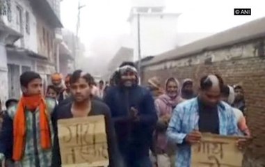 Two thrashed, their heads shaved for stealing cattle