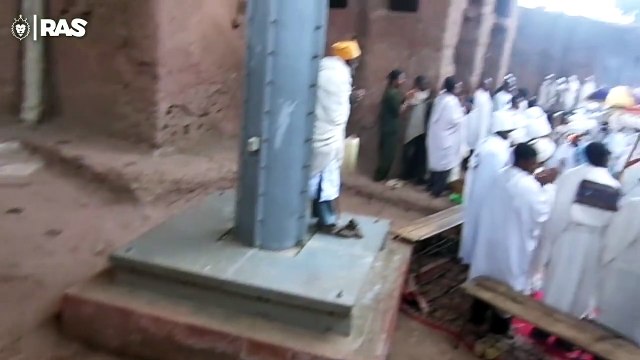 Ethiopia - Tewahedo Priests Chanting At The Gate Of Saint Maryam Church In Lalibela