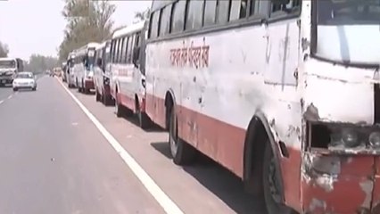 Video herunterladen: Migrants' bus row: 400 buses stationed at Raj-UP border