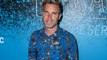 Gary Barlow shows off his weight loss as he poses in old blazer from 2003