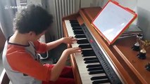 UK 8-year-old with cerebral palsy raises money for school with remarkable piano skills