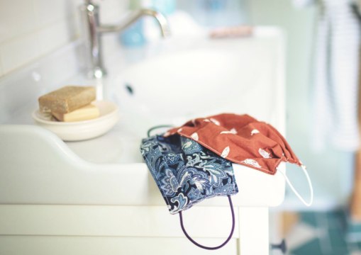 You Should Be Cleaning Your Reusable Face Mask—Here’s How to Do It