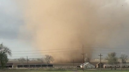 Large tornado towers high into the air in Colorado