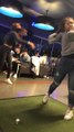 Friend Tricks Girl into Thinking She Struck the Ball While Playing Topgolf