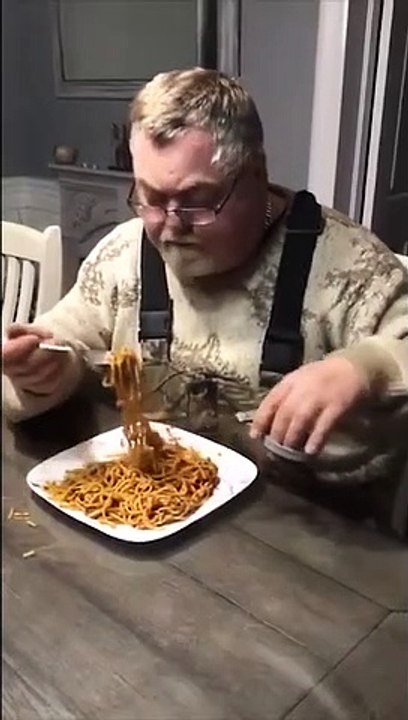 Old Man Eating Spaghetti